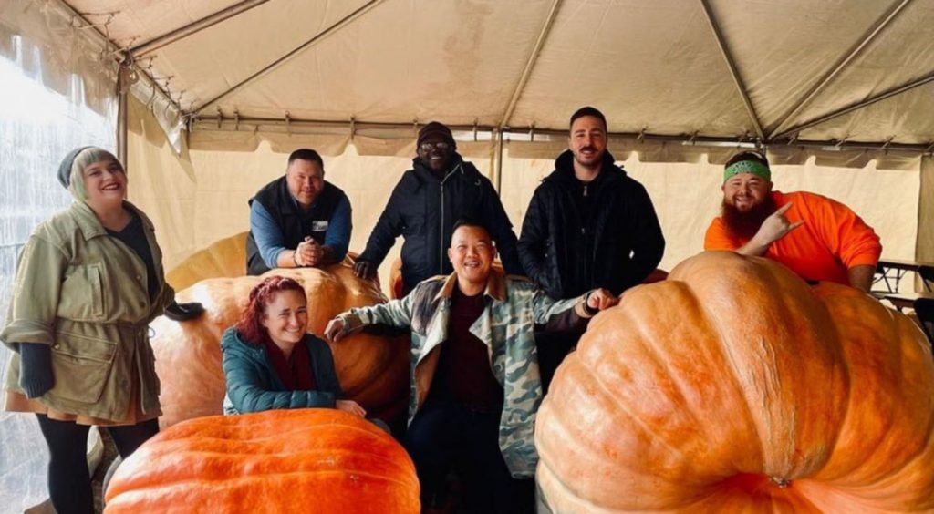 Alan Silva with giant pumpkins